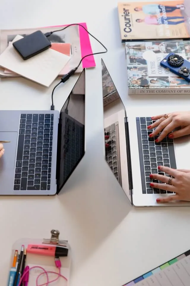 A team working together on their laptops